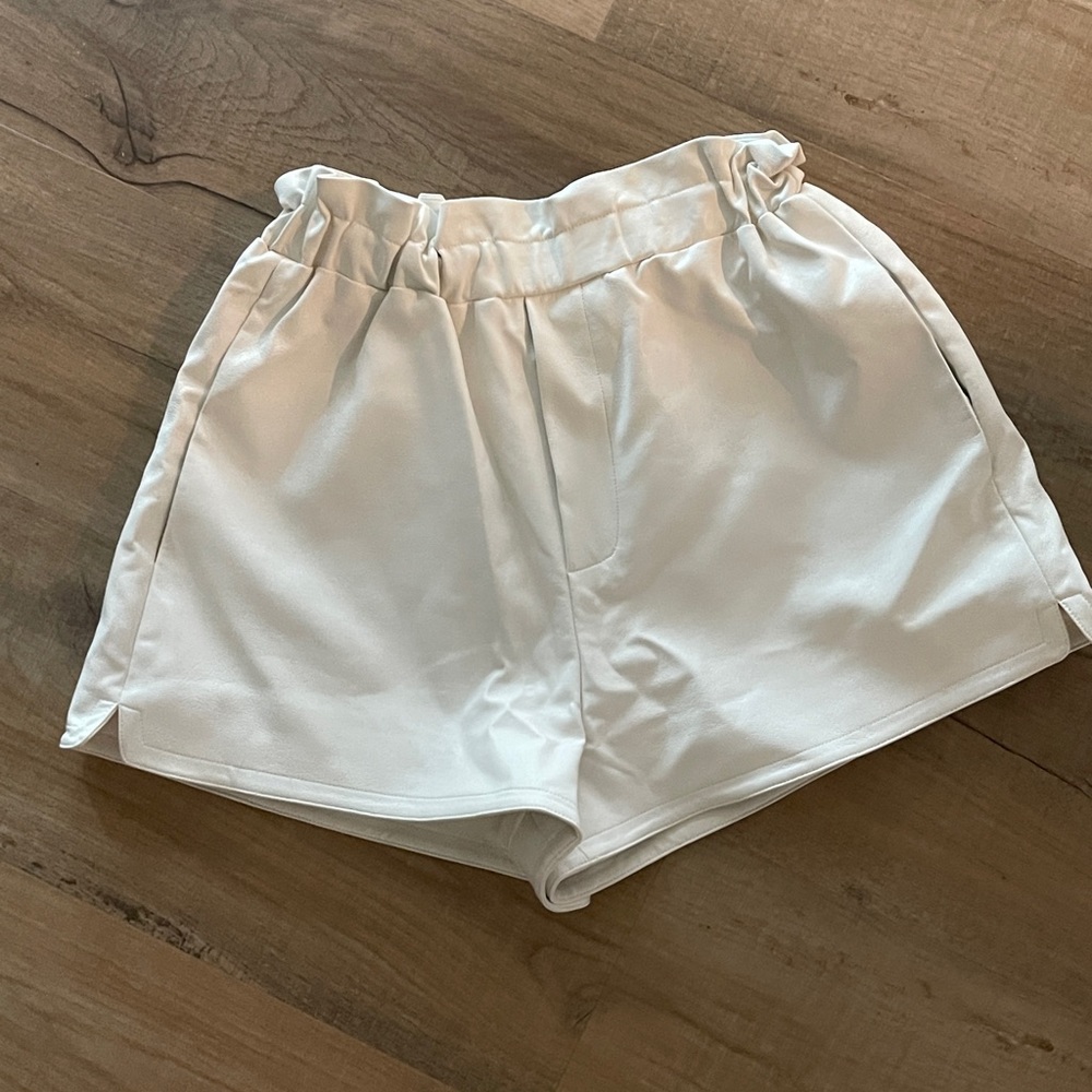 White leather shorts